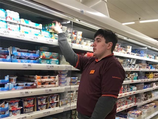 Loughborough College student doing work experience at Sainsbury's