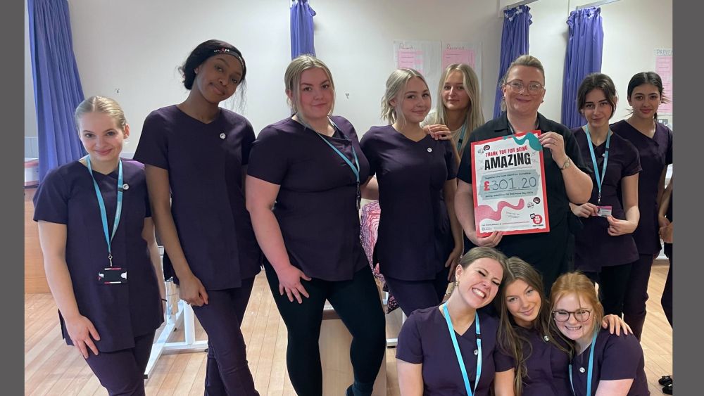 Beauty therapy students and lecturer share their fundraising total