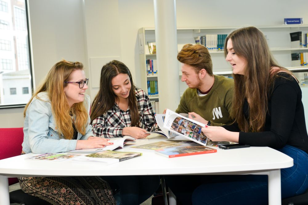 Students working in the College library